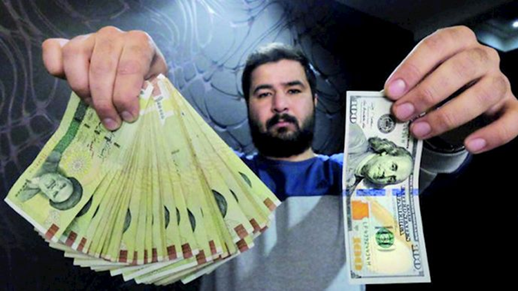 العمله الایرانیه و الدولار